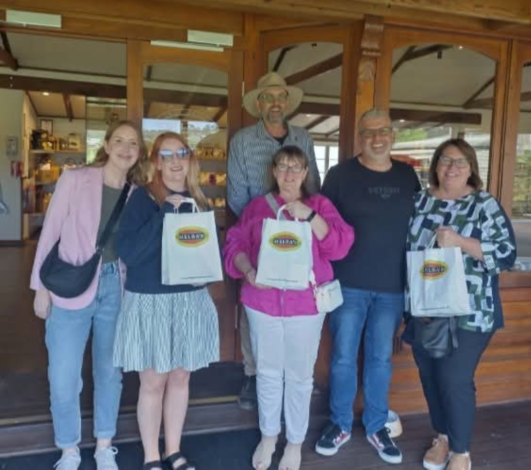 Group with shopping bags at Melbas Chocolates